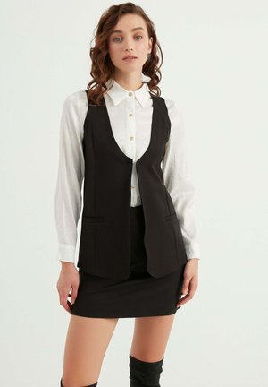 SLEEVELESS WITH POCKETS - Vest - black