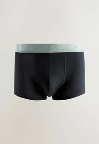 Fekete, pamut boxeralsó világoszöld elasztikus derékpánttal, melyen a "NEXT" felirat található. Simán textúrájú és testhezálló szabású.