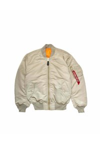 Beige bomber jacket with a front zipper, ribbed cuffs, and waistband. Features an orange lining and a red tag on the left sleeve.