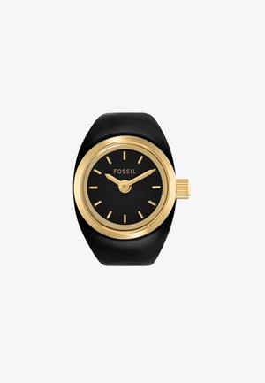 Black watch with a smooth silicone band, gold-tone metal bezel, and a minimalist black dial featuring simple hour markers and hands.