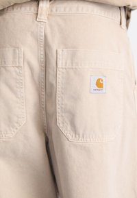 Carhartt WIP GARRISON PANT - Džíny Relaxed Fit - tonic stone dyed