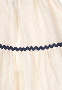 MIPOUNET Falda acampanada - ecru navy