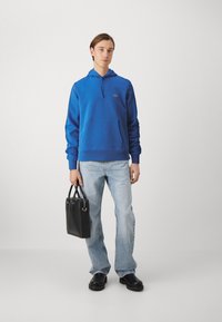 Lacoste Jersey con capucha - ladigue