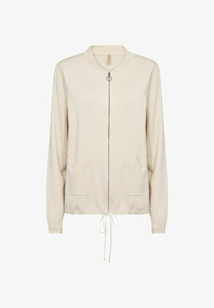 Světle béžový kardigan na zip s dlouhými rukávy, kulatým límcem, dvěma předními kapsami a stahovací šňůrkou na lemu.