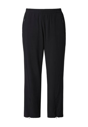 Mustat urheiluhousut, jotka on valmistettu kevyestä kankaasta, niissä on joustava vyötärönauha ja kaksi vetoketjullista sivutaskua; kapeat lahkeet, joissa kireät resorit.