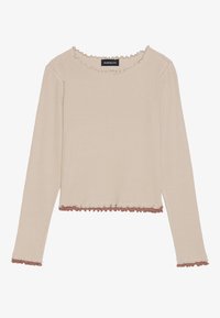 Šviesiai rudos spalvos ilgomis rankovėmis viršus su banguota tekstūra, turintis kontrastingo rudo atspalvio apykaklę ir apatinę kraštą. Matomas prekės ženklas.