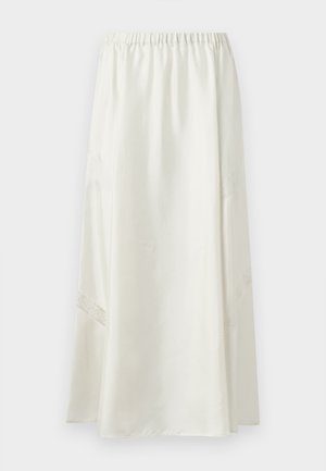 Long white skirt with elastic waistband and subtle lace inserts on lower sides, displayed against a plain background.