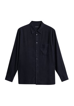 Navy blue long-sleeve shirt made of cotton, featuring a button-up front, collar, and a single chest pocket on the left side.