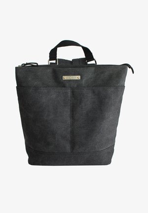Black canvas tote bag with dual top handles, zip closure, front pocket, and metal logo plate. Sturdy design with a textured finish.