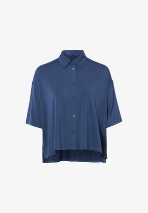 Chemise bleu marine ample à manches courtes, col pointu et fermeture boutonnée à l'avant, ourlet arrière légèrement plus long.
