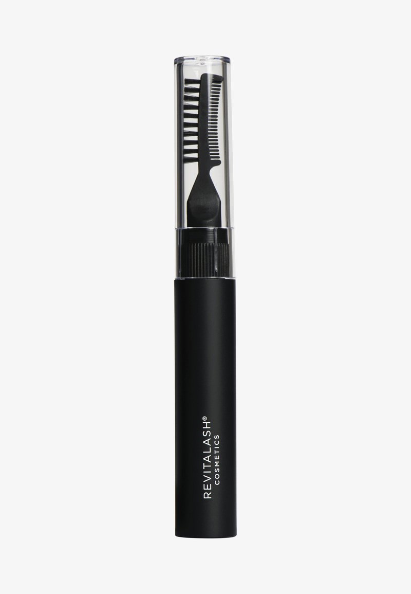 Applicatore cosmetico nero con cappuccio trasparente, dotato di un lato a pettine e un lato piatto per un'applicazione precisa.