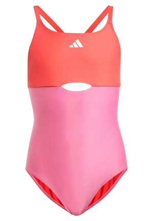 Costume intero da ragazza con parte superiore corallo, parte inferiore rosa, dettaglio ritagliato sotto il torace e logo Adidas bianco sul petto.