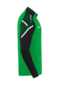 Grünes Sportshirt mit schwarzen Ärmeln, das über eine strukturierte, gemusterte Schulter, weiße Akzente und einen hohen Kragen mit Reißverschluss verfügt.
