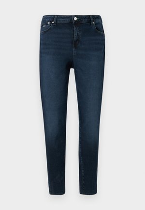 Tumedad sinised teksad, mis on valmistatud denimist, omavad kitsast istuvust, viie tasku disaini, ees nuppude sulgemist ja tagasihoidlikke pleekimisdetailide.