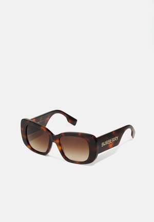 Gafas de sol de carey con forma cuadrada, lentes marrones degradados y logotipo dorado de "BURBERRY" en las patillas. Acabado en plástico suave.