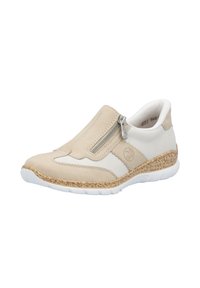 Chaussure beige à enfiler avec une tige en cuir texturé, des accents en mesh et une fermeture éclair décorative. Caractéristiques d'une semelle en caoutchouc blanc léger avec des détails en liège.