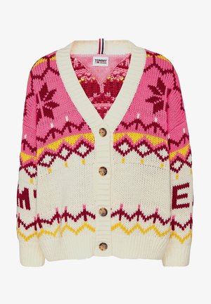 Cardigan en maille épaisse blanc, rose, jaune et marron avec motifs nordiques, boutons en bois, col en V et étiquette Tommy Jeans à l'intérieur du col.