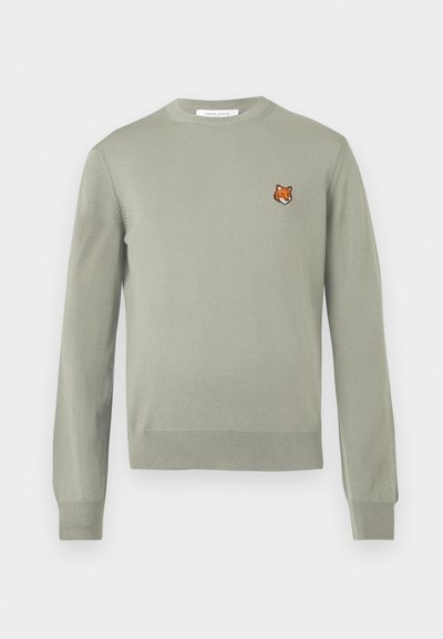 Hele rohelise värvi pikkade varrukatega sviiter, millel on ümar kaelus. Ees on väike tikitud rebane pea. Pehme tekstuur.
