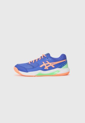 Blue sports shoe with orange laces and logo. Features a breathable mesh upper, white midsole, and a green accent near the heel.