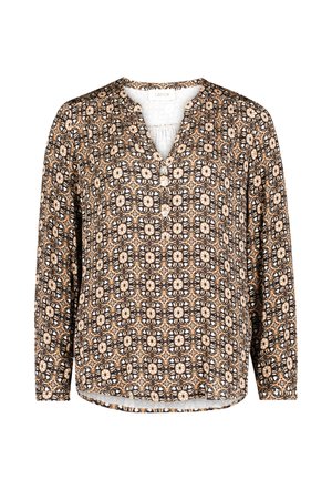 Langærmet bluse i sort og creme med et geometrisk blomsterprint. Har V-udskæring og knapdetalje foran.