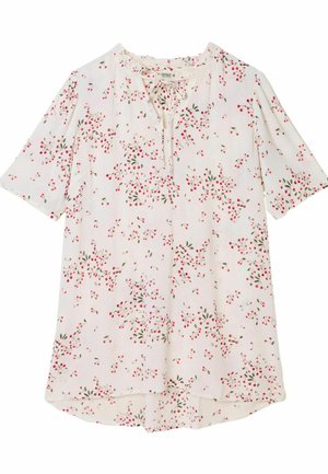Weiße kurzärmlige Bluse mit Schlüssellochausschnitt, verziert mit einem floralen Muster aus roten und grünen Blättern auf einem strukturierten Stoff.