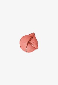Blush rond et texturé dans une teinte rose muted avec une finition chatoyante, présentant une surface craquée et des bords doux.
