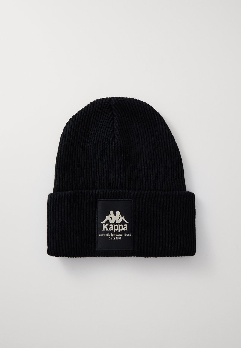 Black ribbed knit beanie with a folded cuff. Features a rectangular logo patch with white text and a graphic, made of soft material.