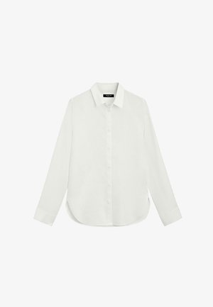 Chemise blanche à manches longues avec boutons, col, manches avec poignets et ourlet légèrement arrondi.