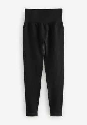 Black ribbed leggings with a wide waistband. The fabric is stretchy with a smooth texture, tapering at the ankle for a fitted silhouette.