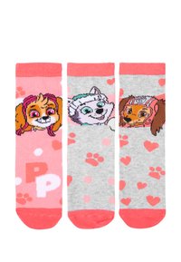 Tre paia di calze a compressione con colori rosa e grigio, caratterizzate da divertenti design di cani, cuori e impronte di zampe. Realizzate in tessuto morbido ed elastico.