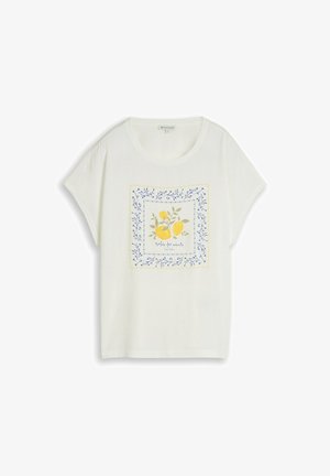T-shirt blanc à manches courtes avec col rond, présentant un motif de citron et feuille encadré par des branches bleues et le texte "Dolce far niente."