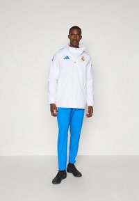 adidas Performance REAL MADRID 25/26 TIRO25 COMPETITION ALL WEATHER JACKET - Club wear - white