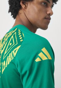 adidas Performance JAMAICA JFF PREMATCH SHIRT - Equipación de selecciones - bold green
