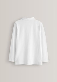 Polo-shirt à manches longues, blanc, avec col, fabriqué dans un matériau doux. Présente un ourlet droit et un design simple, sans embellissements visibles.