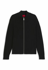 Cardigan zip-up a costine nere con colletto alto, maniche lunghe e un'etichetta rossa all'interno del colletto.