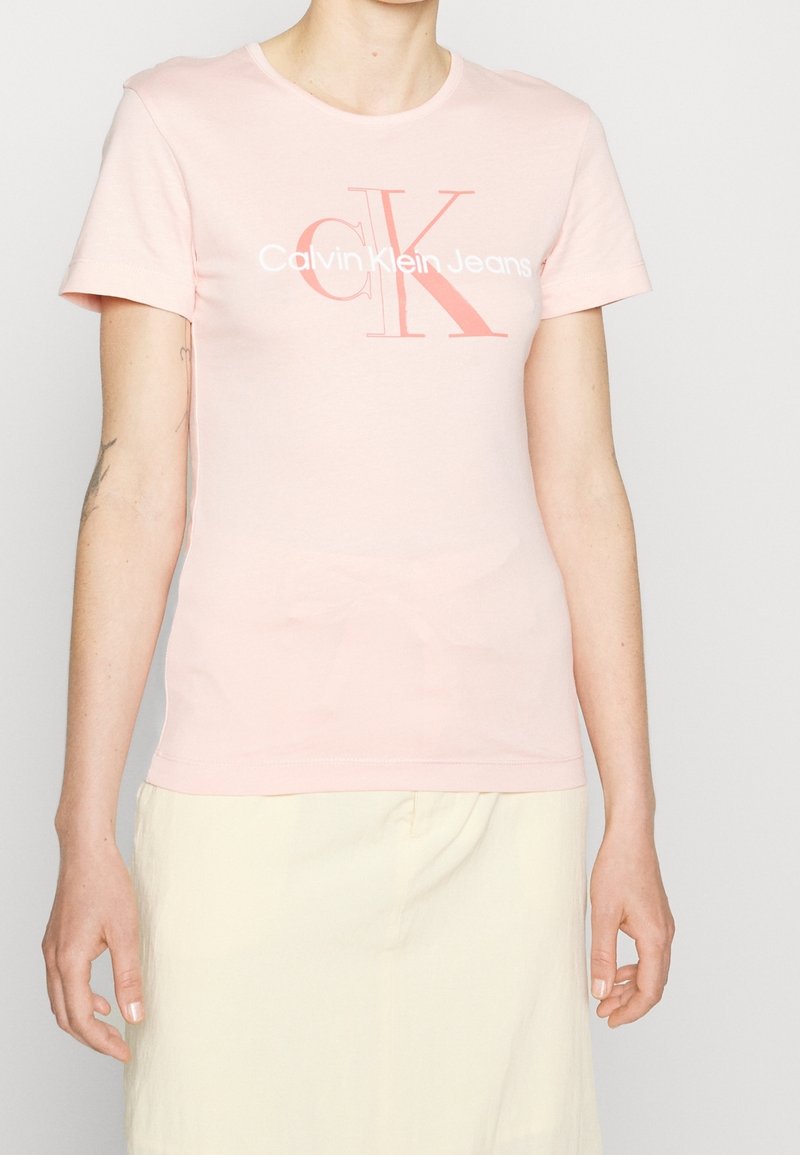 Calvin Klein Jeans Triko s potiskem - pink