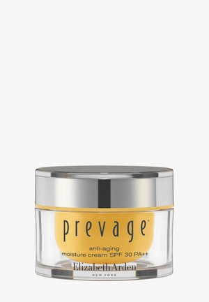 Pot de crème hydratante anti-âge Prevage avec SPF 30 PA++ par Elizabeth Arden, crème jaune dans un récipient transparent avec un couvercle argenté.
