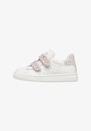 White leather sneaker with two pink glitter Velcro straps, perforated sides, and a light gray glitter heel accent. Flat rubber sole.