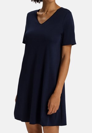 Abito corto blu navy a maniche corte con scollo a V, realizzato in tessuto liscio. Vestibilità ampia con orlo a sbuffo e senza motivi o accenti visibili.