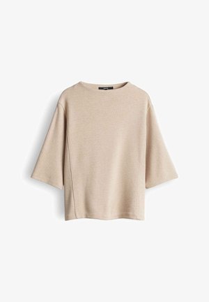 Beige top met korte mouwen en een ronde hals, gemaakt van zachte stof. Heeft een losse pasvorm en subtiele zijnaden voor een eigentijdse uitstraling.