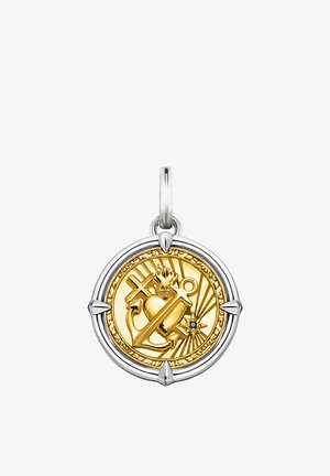 Runder goldener Medaillon mit Anker, flammendem Herzen, Kreuz- und Sternsymbolen, eingefasst in einem silbernen Rahmen mit vier spitzen Akzenten.