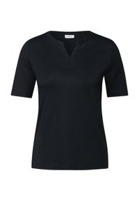 Haut noir à manches courtes avec un décolleté en V et un ourlet droit. Fabriqué à partir d'un tissu lisse au toucher doux. Les étiquettes indiquent la marque "CECI."