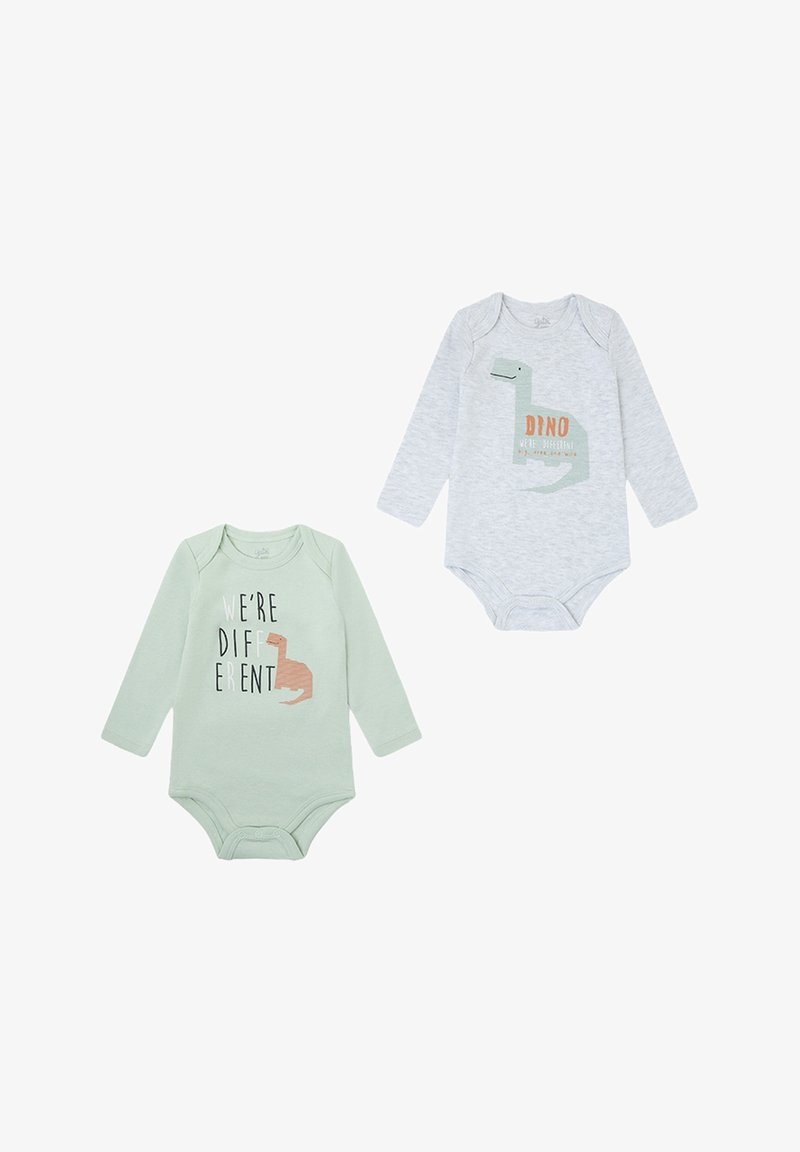 Dos bodis de manga larga para bebé: uno verde menta con el texto "SOMOS DIFERENTES" y otro gris claro con un gráfico de dinosaurio y el texto "DINO SOMOS DIFERENTES."
