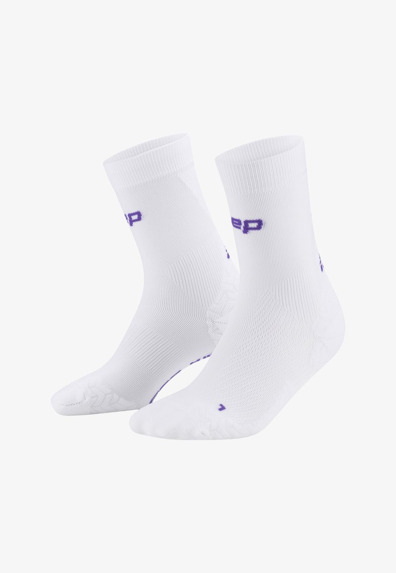 Weiße Sportsocken mit lila Branding, einem gerippten Bündchen und einer texturierten Sohle für besseren Grip. Knöchellang mit einer enganliegenden Passform.