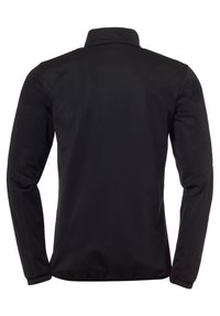 Veste softshell noire avec col monté, manches longues et texture lisse. Présente un design simple sans matériel visible ni embellissements.