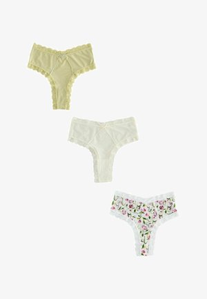 Drei damen-Spitztangas mit Spitzenbesatz in blassgelb, weiß und weiß mit rosa Blumenmuster, auf weißem Hintergrund angeordnet.