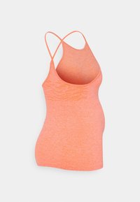Sleeveless seamless coral orange tank top with crisscross thin shoulder straps and perforated detail on upper sides.