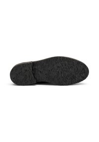 Suola di scarpa in gomma nera con superficie texturizzata caratterizzata da scanalature e rilievi per una migliore aderenza. Punta arrotondata e tacco piatto.