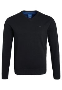 Svart V-ringad tröja i mjukt material. Långa ärmar och ribbad nederkant. Diskret logotyp på bröstet. Lämplig för avslappnat bruk.