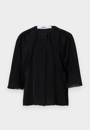 Black short-sleeved top with fringe details along the shoulders and cuffs. Soft fabric, relaxed fit, and front pleat. Brand label: DAY.